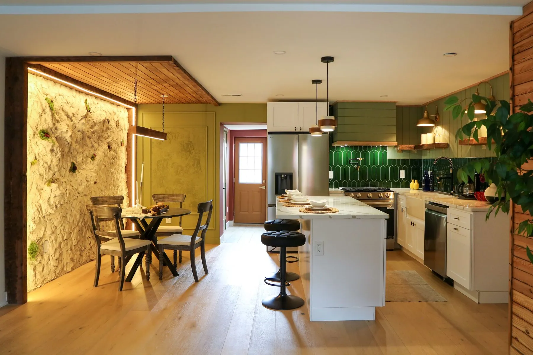 Modern kitchen layout featuring UMG cabinetry and finishes