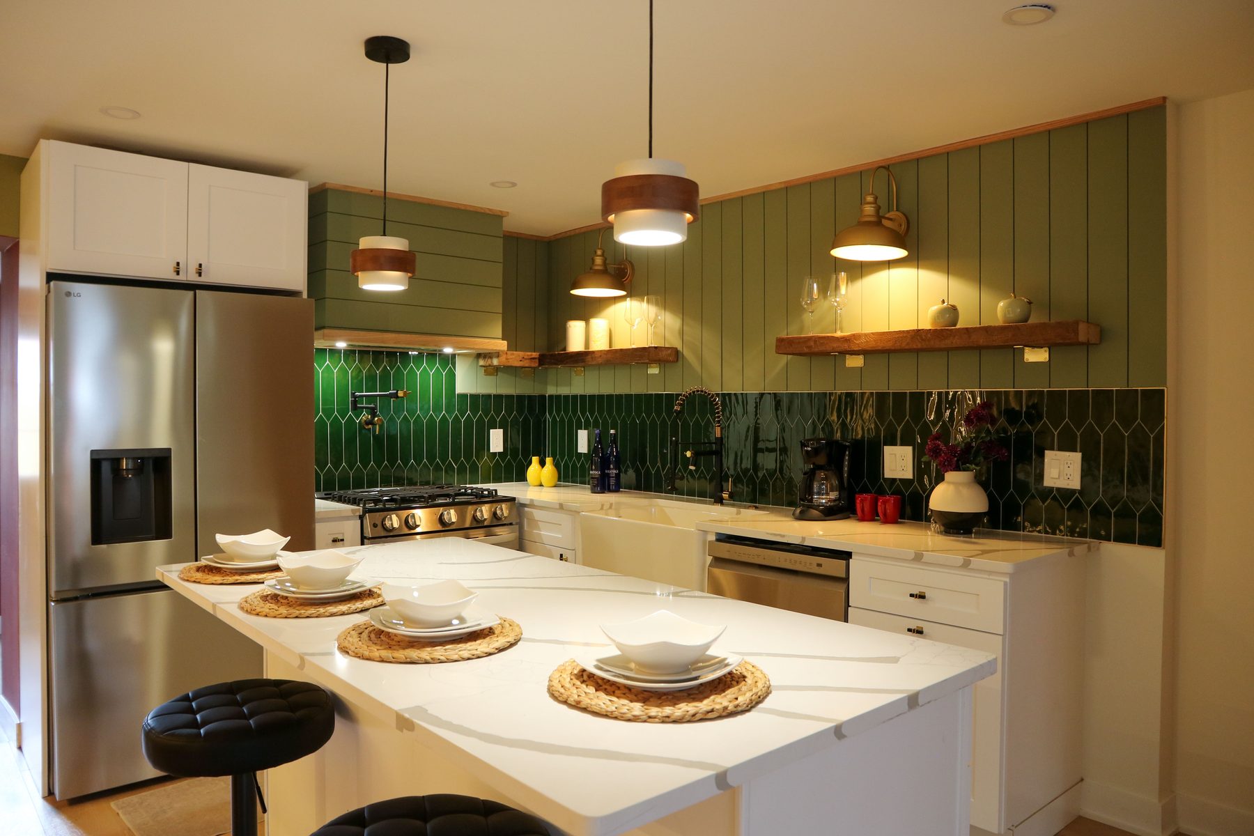 Recent UMG kitchen project featuring custom cabinetry and stone counters