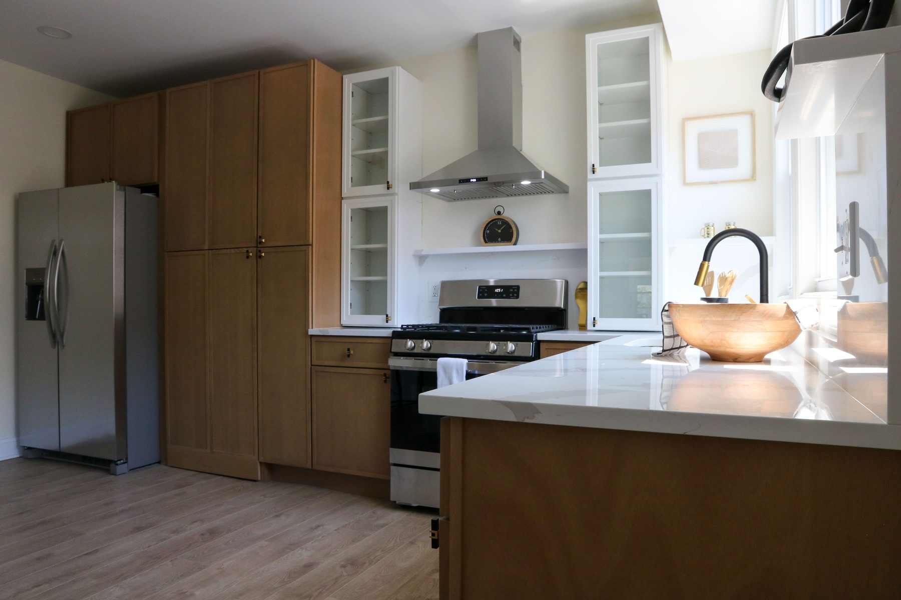 Recent kitchen install with stone countertop and custom cabinets