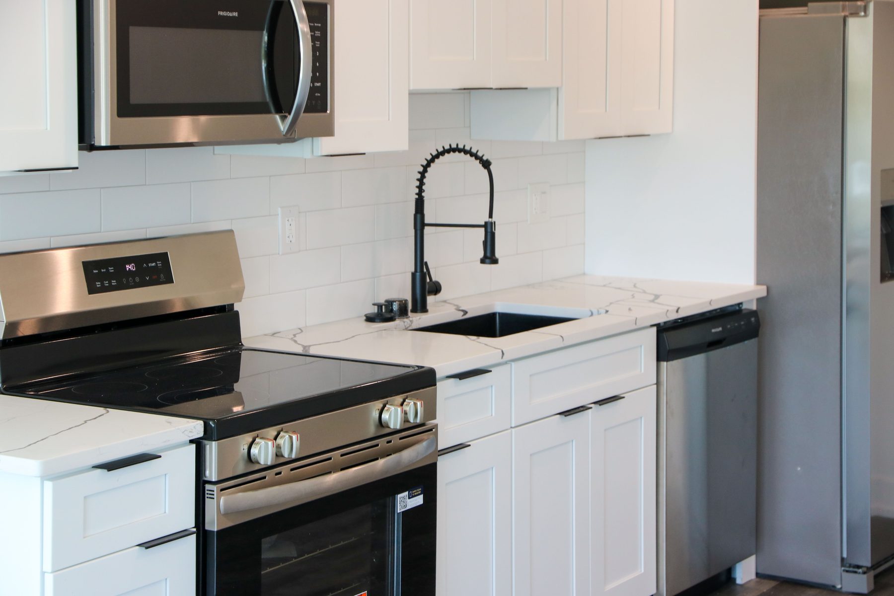 South Philly project featuring custom cabinetry and stone counters