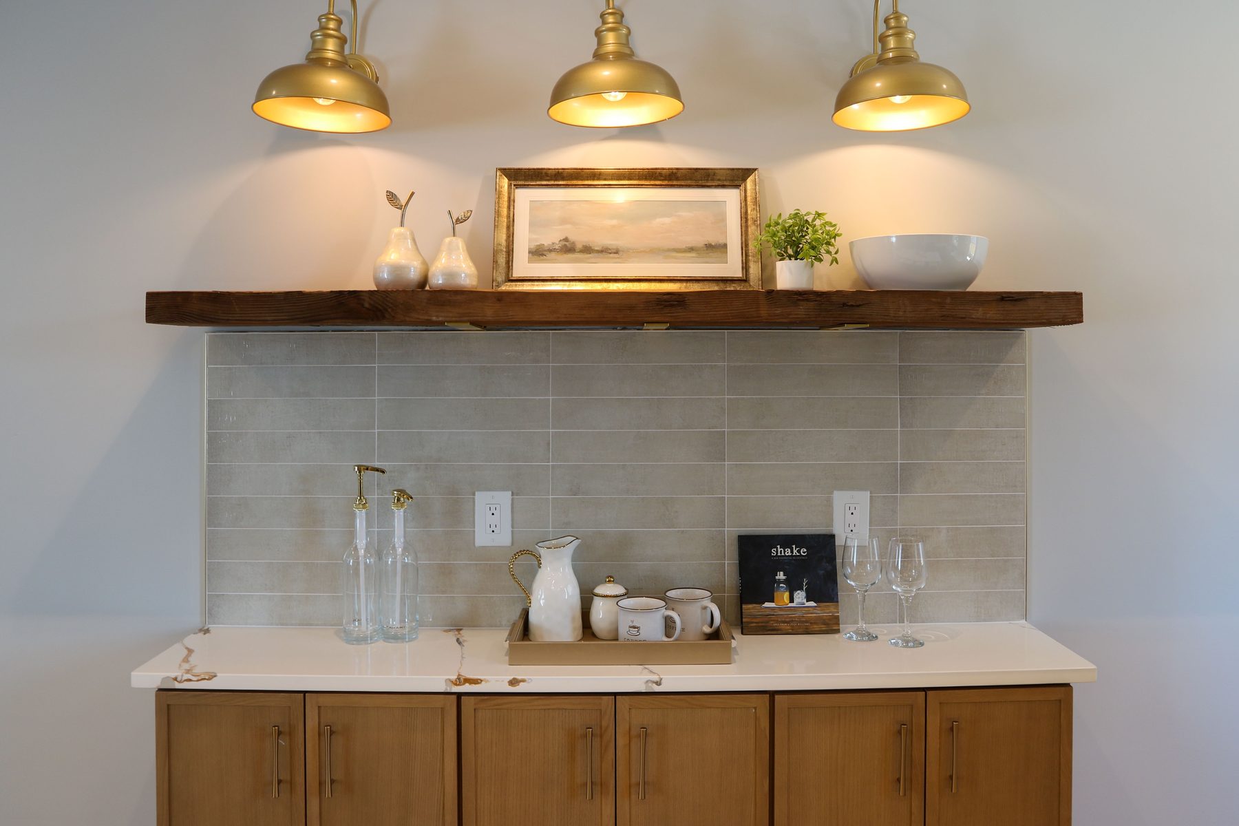 Completed kitchen project with stone countertops and custom cabinetry