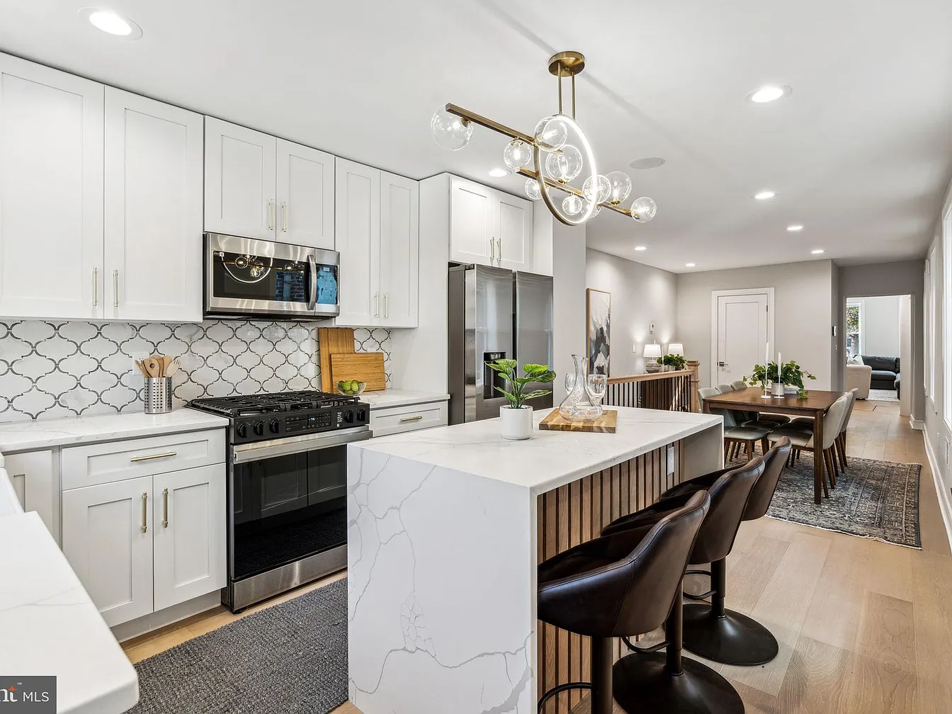 Completed kitchen showing countertop, cabinets, and backsplash together