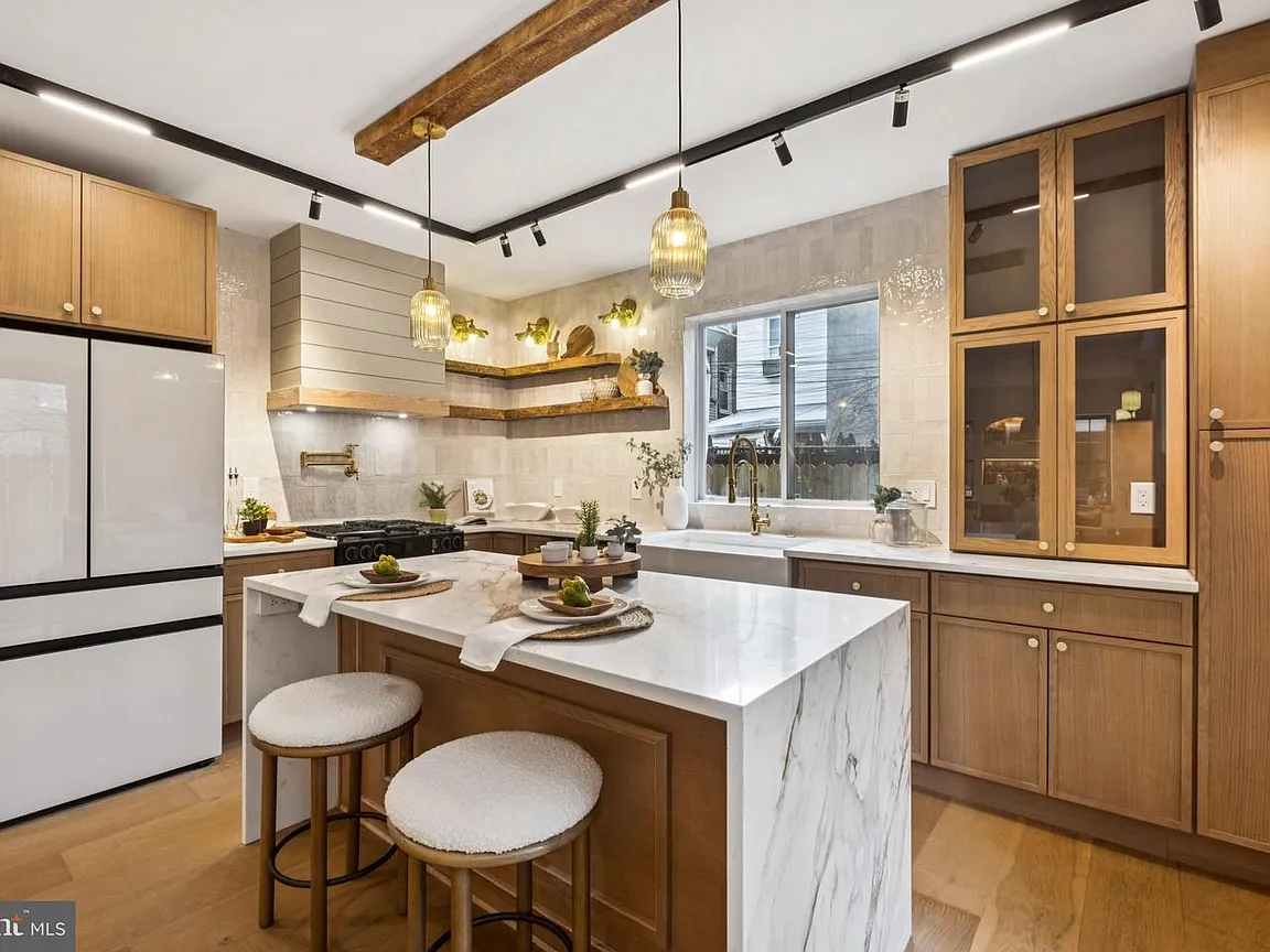 Dark wood kitchen cabinets with light countertops