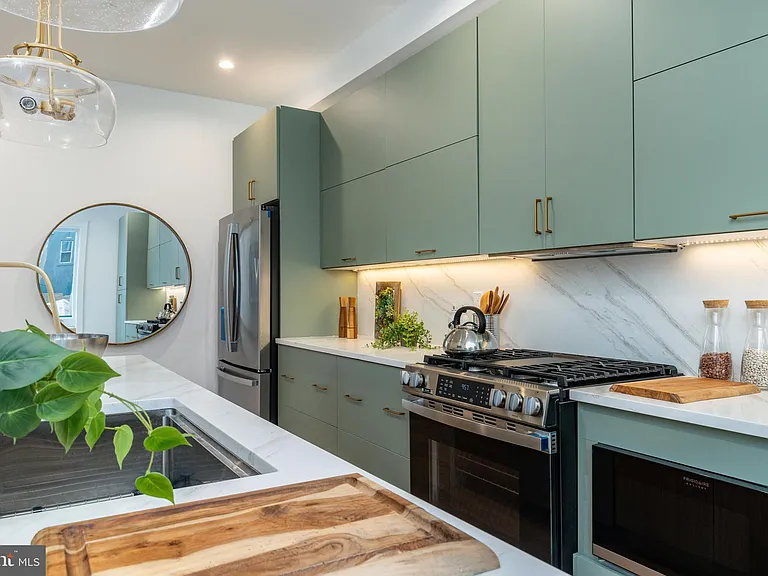 Kitchen under construction showing new cabinet install