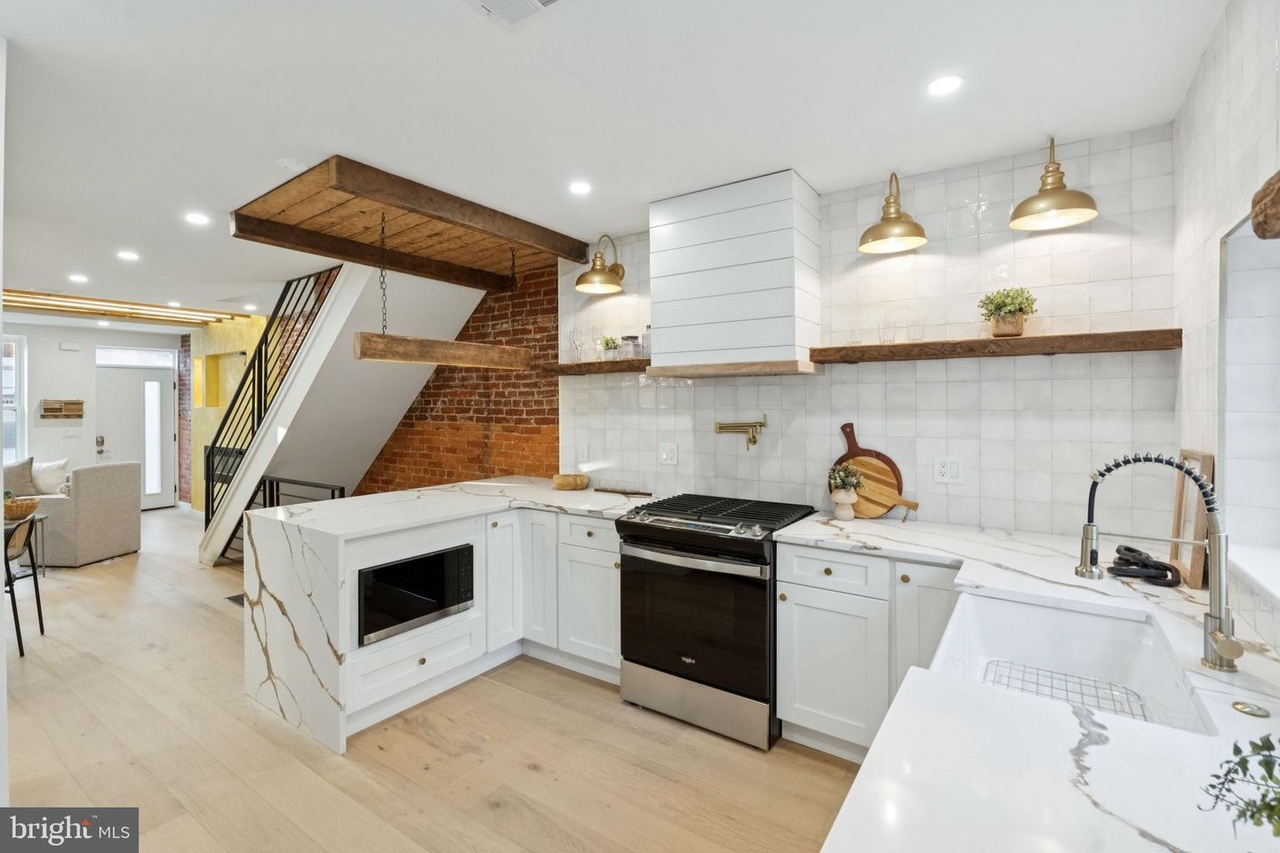 Wide view of a completed kitchen remodel by UMG