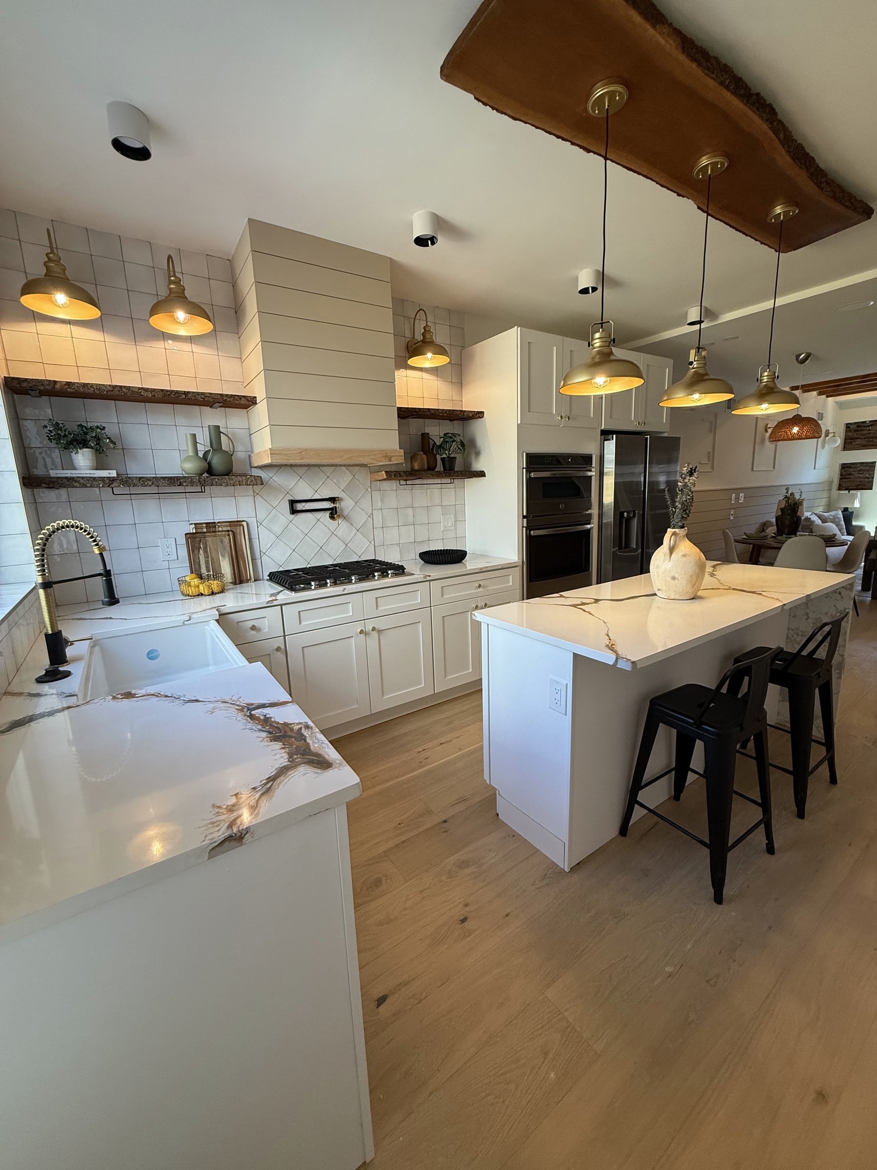 Tall display of cabinet door styles and matching countertop samples