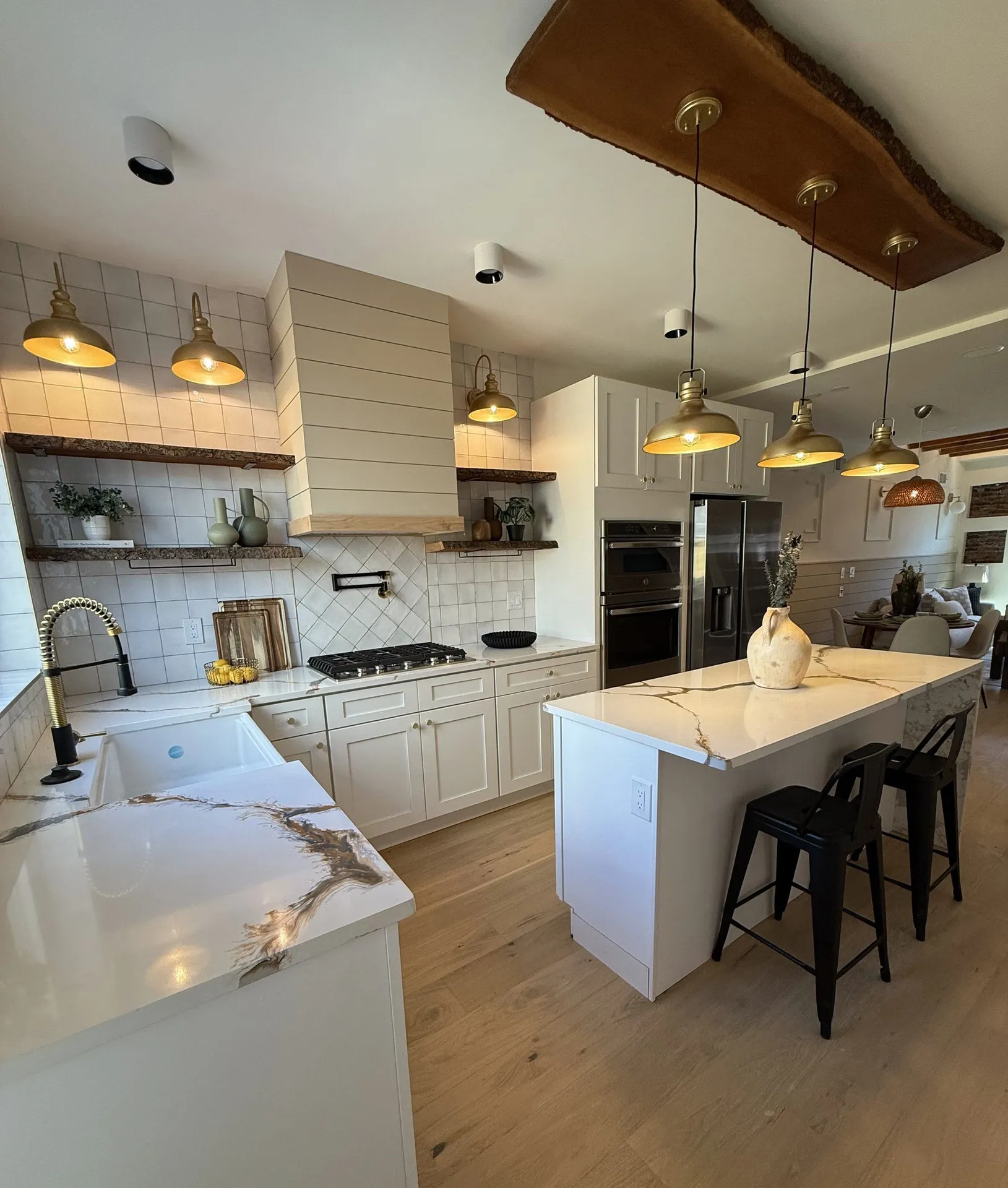 Tall display of cabinet door styles and matching countertop samples