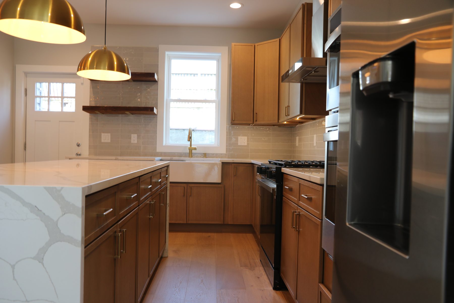 Kitchen island and surrounding cabinetry in a recent install