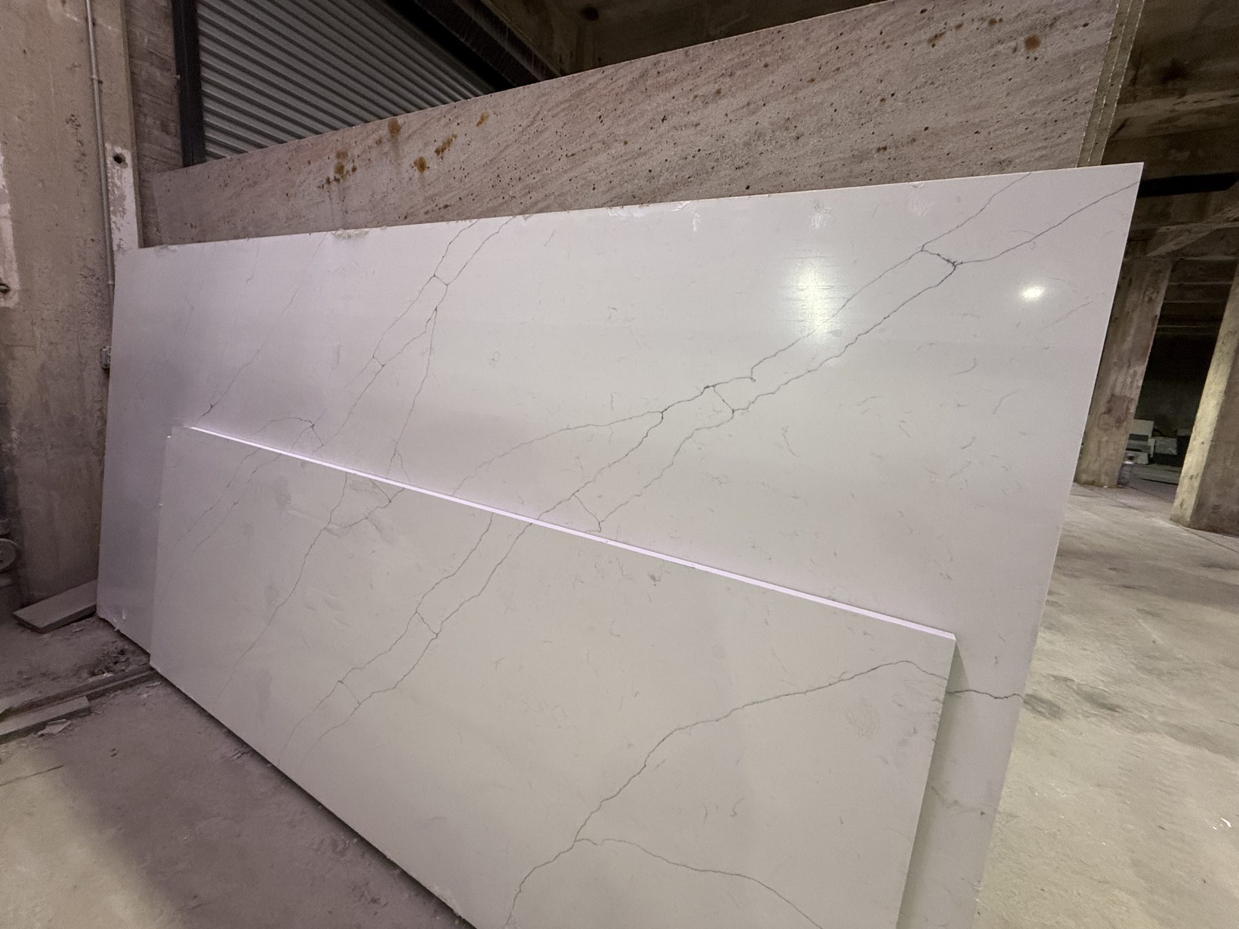 Stacked slabs in the working warehouse